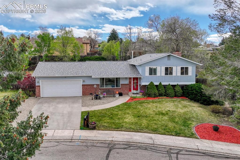 Image 2 of 42: The home sits on a spacious 0.29-acre lot. You will love pulling into the a