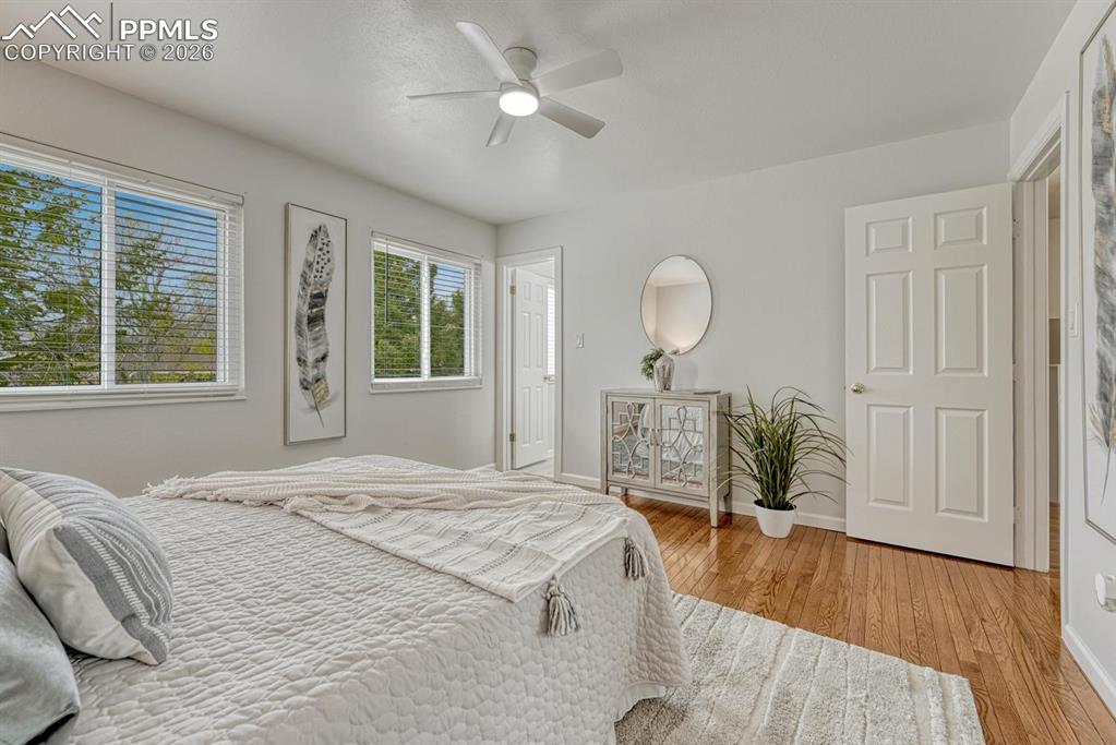 Image 23 of 42: The primary bedroom is designed for true relaxation and offers plenty of sp