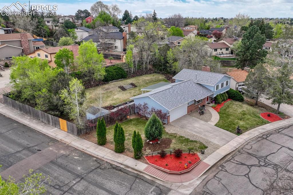 Image 39 of 42: An aerial view of the property shows its fantastic location near parks, sch