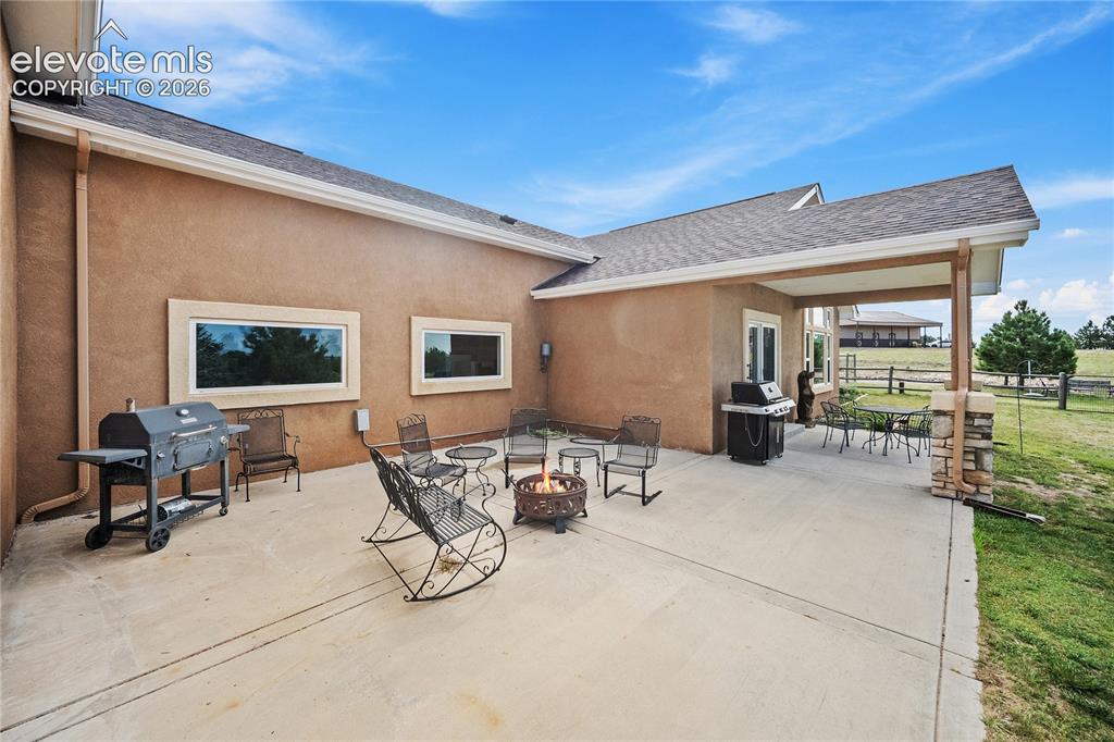 Image 37 of 42: Covered patio and entertaining space. 