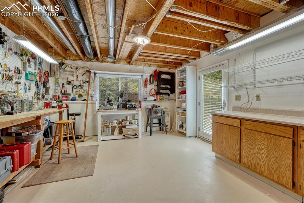 Image 36 of 50: Workshop with walk-out