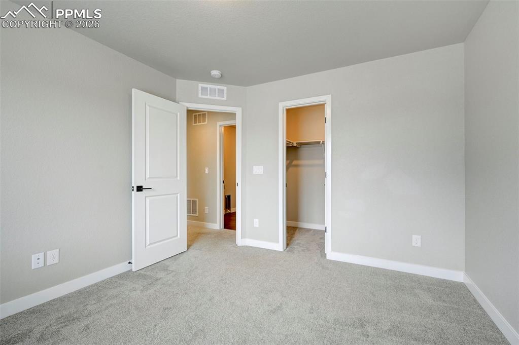 Image 32 of 39: Bedroom