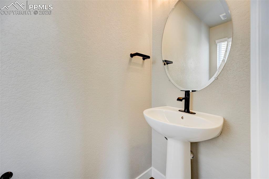 Image 7 of 39: Main floor bathroom