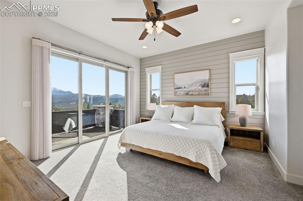 Image 25 of 49: Master suite with private walkout to deck