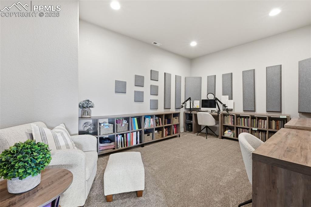 Image 46 of 49: Large basement office/ pod cast.