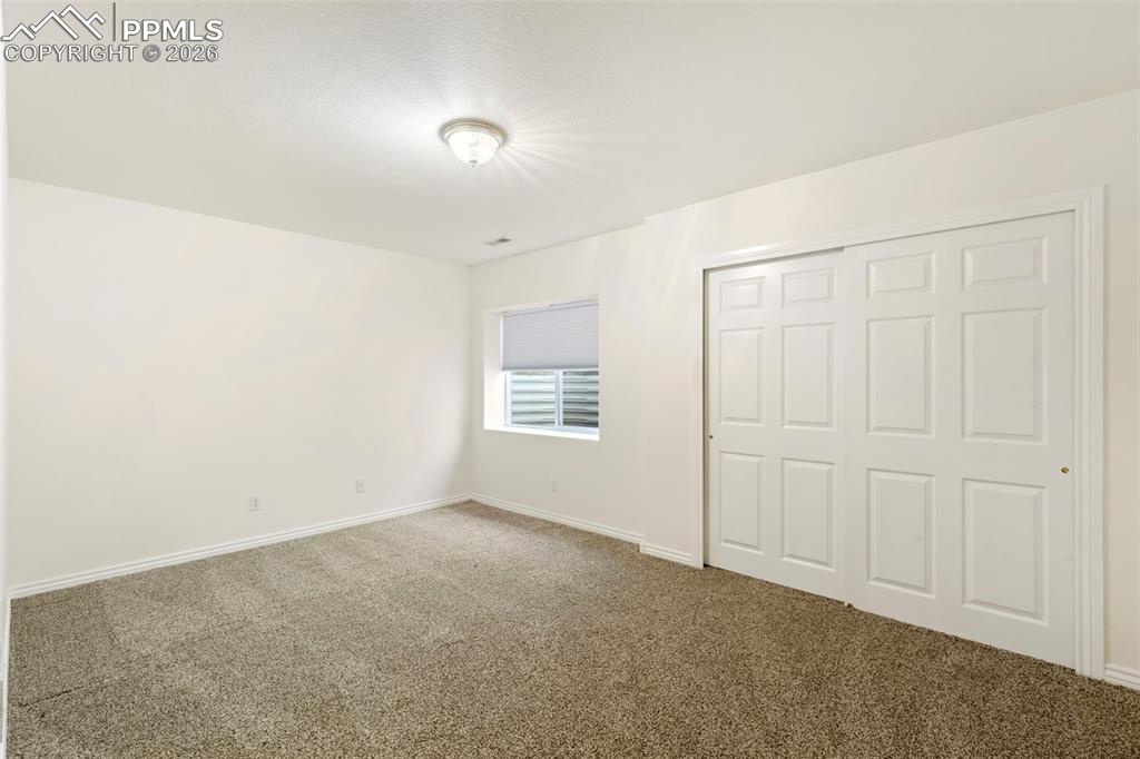 Image 28 of 39: Bedroom