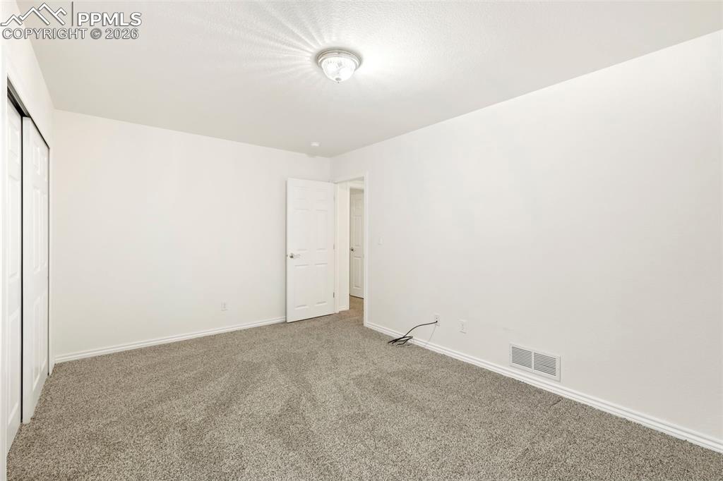 Image 29 of 39: Bedroom