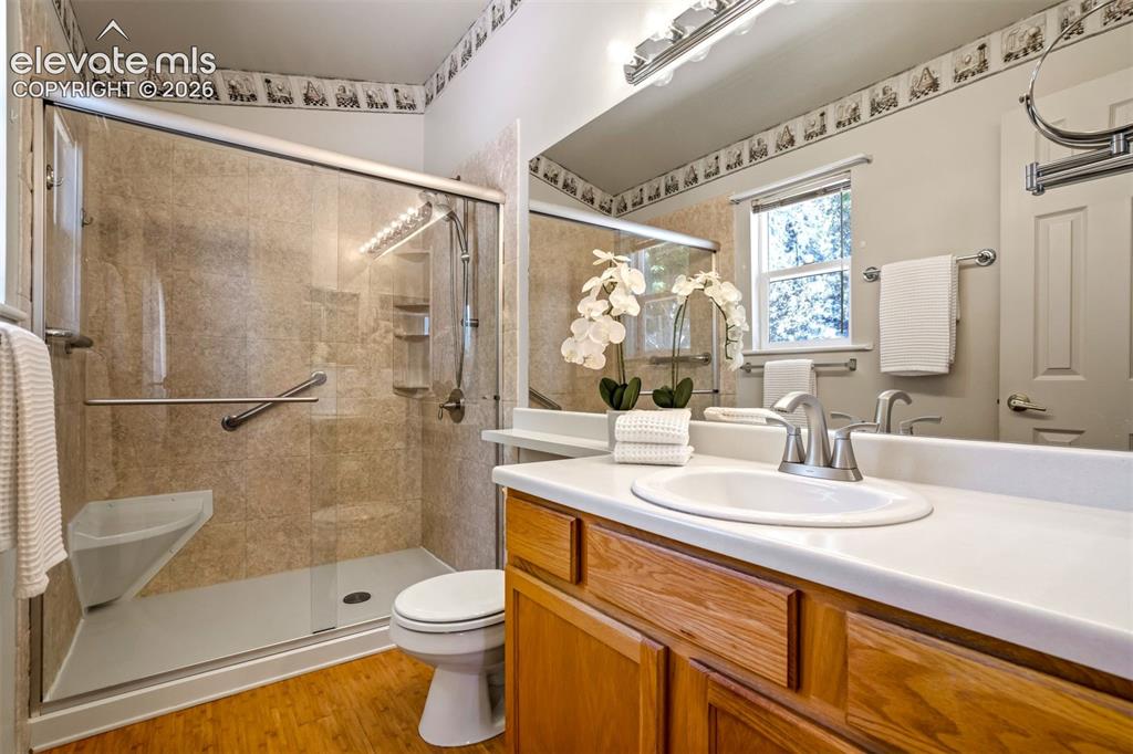 Image 12 of 41: Beautiful oversized shower with bench