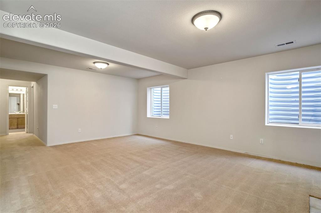 Image 21 of 41: Basement family room
