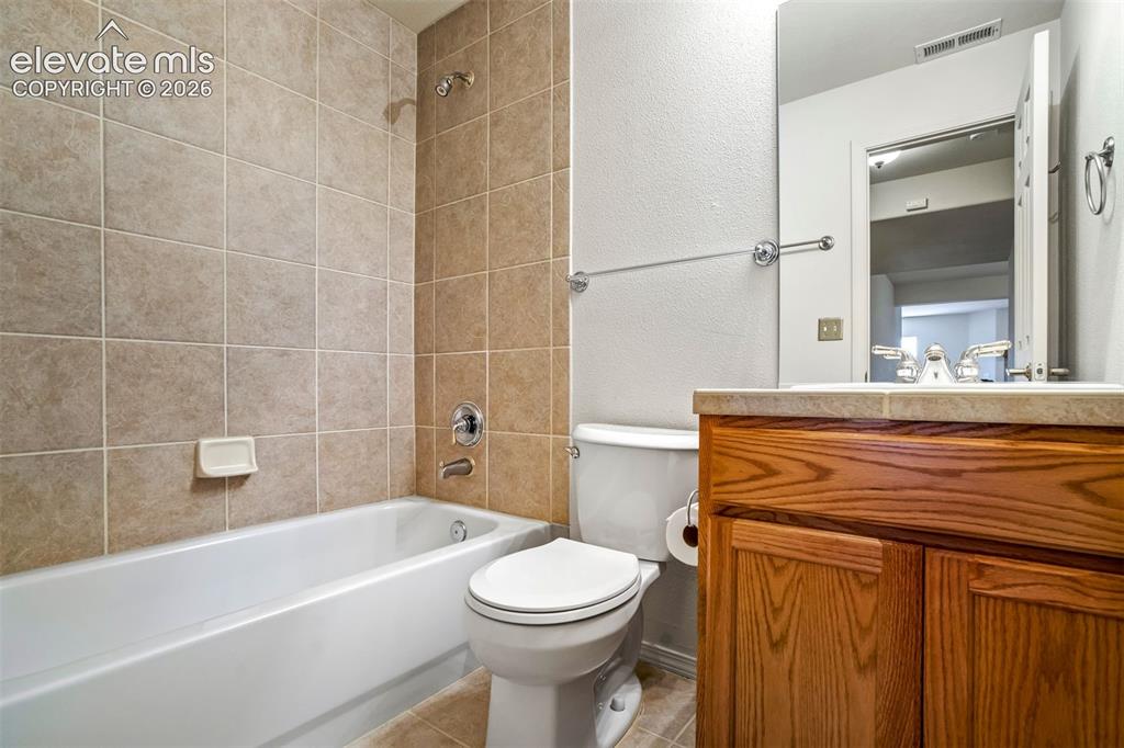 Image 31 of 41: Full basement bathroom