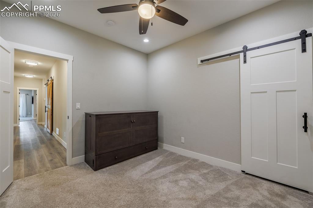 Image 32 of 38: Bedroom