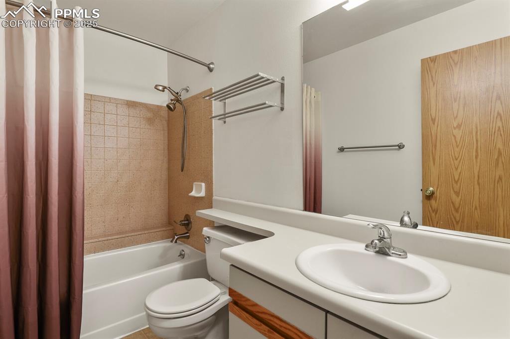 Image 15 of 30: Full bath featuring shower / bath combo and vanity