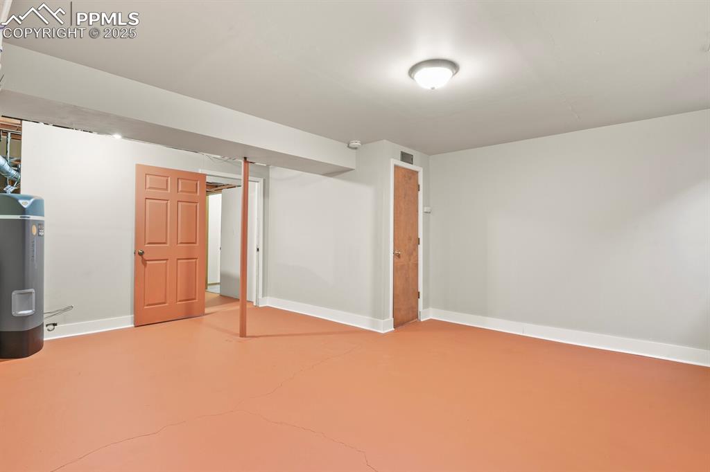 Image 21 of 30: Finished basement room, third bedroom if needed