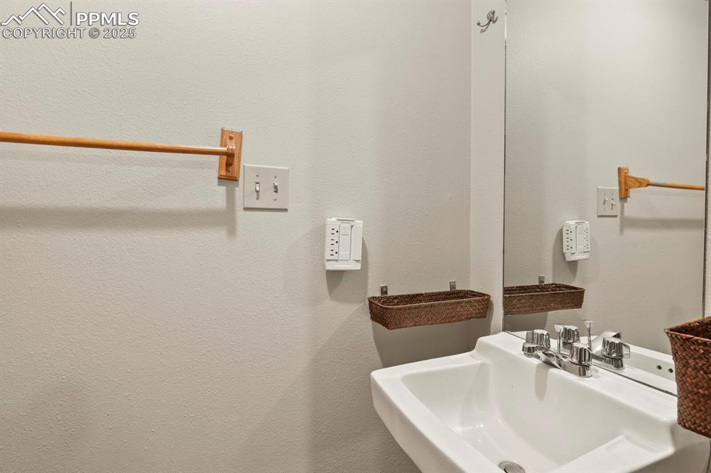 Image 23 of 30: Bathroom with a sink