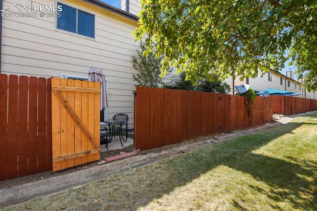 Image 30 of 30: View of yard featuring a patio area