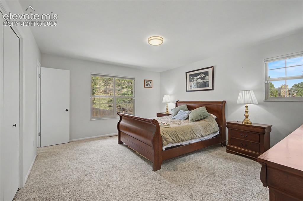 Image 16 of 43: Retreat to the primary suite with an ensuite bath and wake up to a gorgeous
