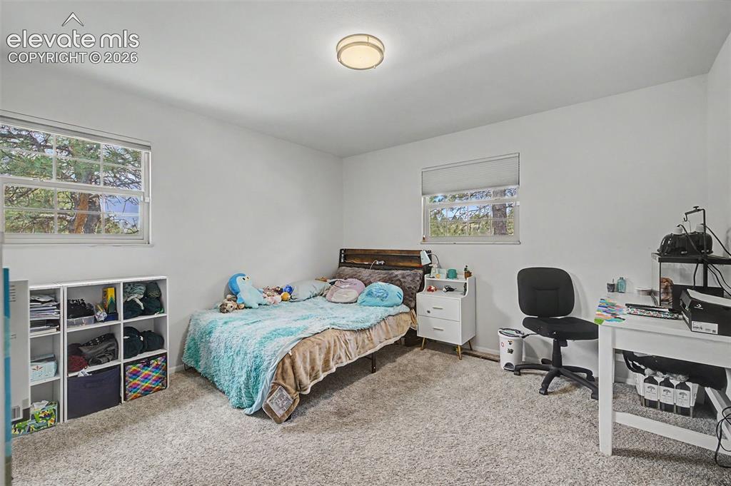 Image 19 of 43: Main floor bedroom