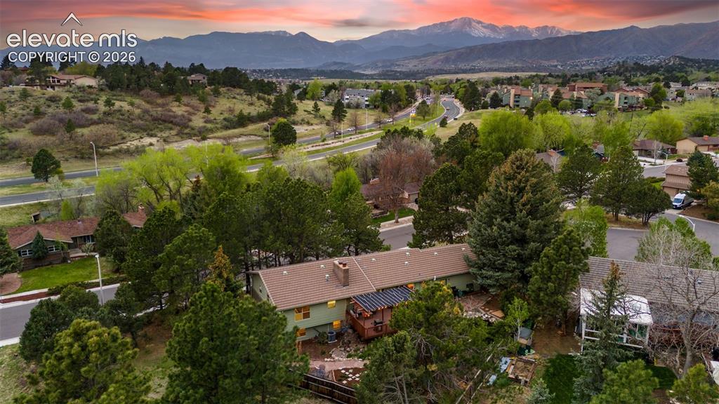 Image 40 of 43: Breathtaking view of Pikes Peak at sunset