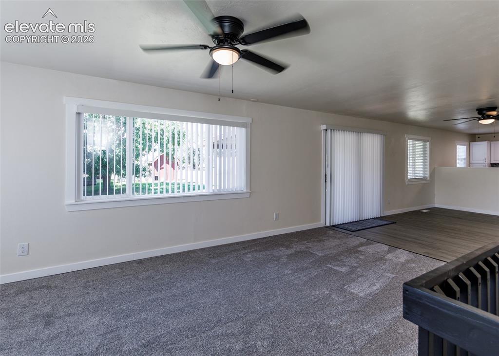 Image 10 of 49: Family Room & Dining Room