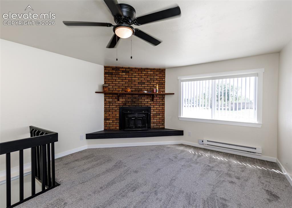 Image 9 of 49: Fireplace in Family Room