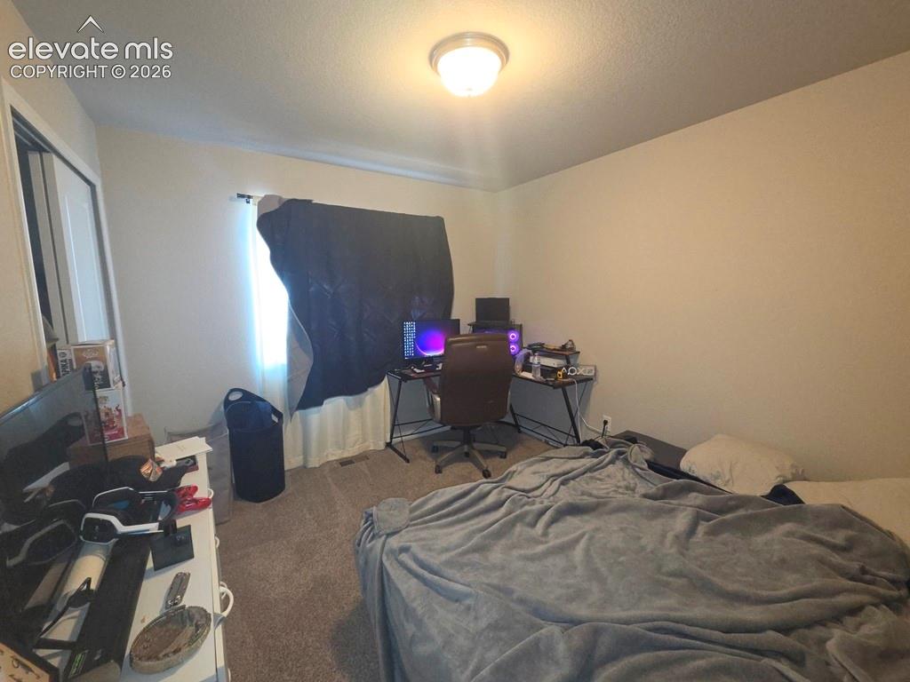 Image 12 of 19: Bedroom