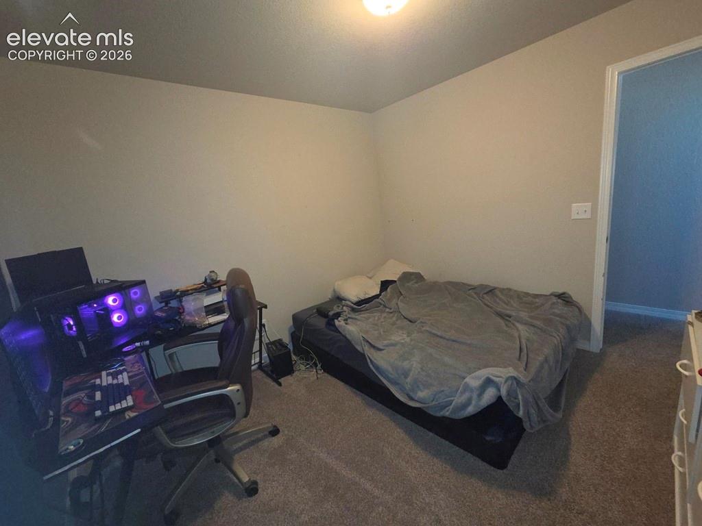 Image 13 of 19: Bedroom