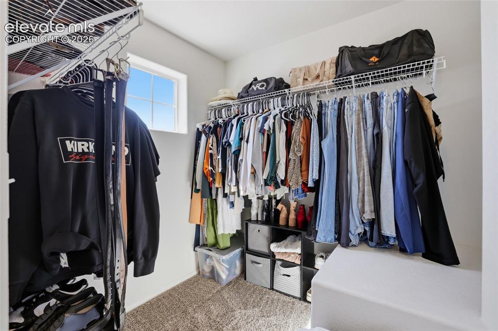 Image 26 of 50: Walk-In Closets