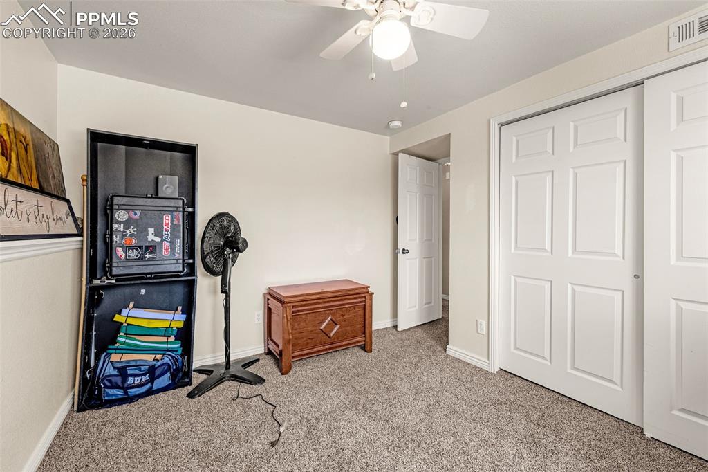 Image 22 of 38: Bedroom