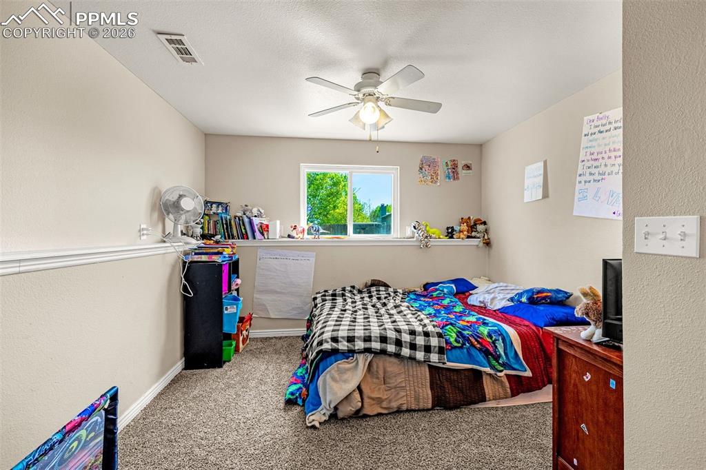 Image 23 of 38: Bedroom