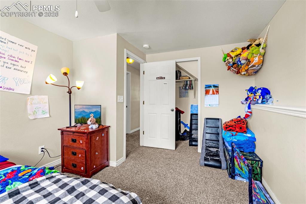 Image 24 of 38: Bedroom