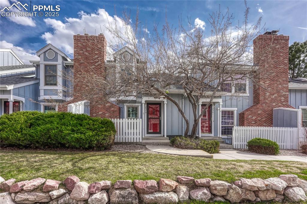 Caption: Charming ground floor townhome with 1,265 square feet.