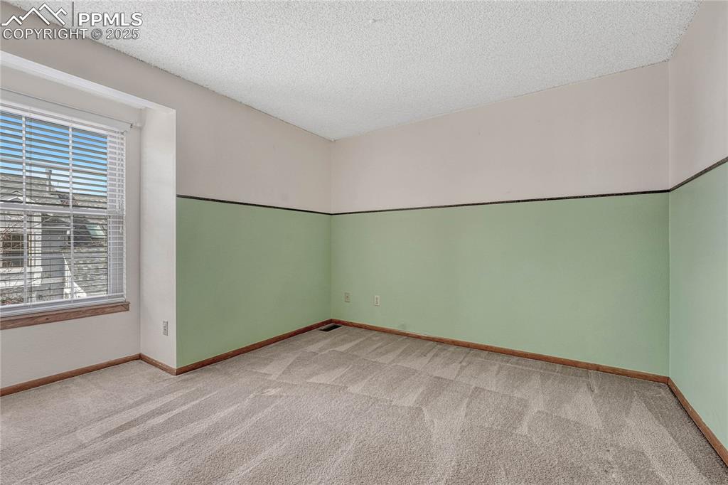 Image 22 of 28: 2nd bedroom.