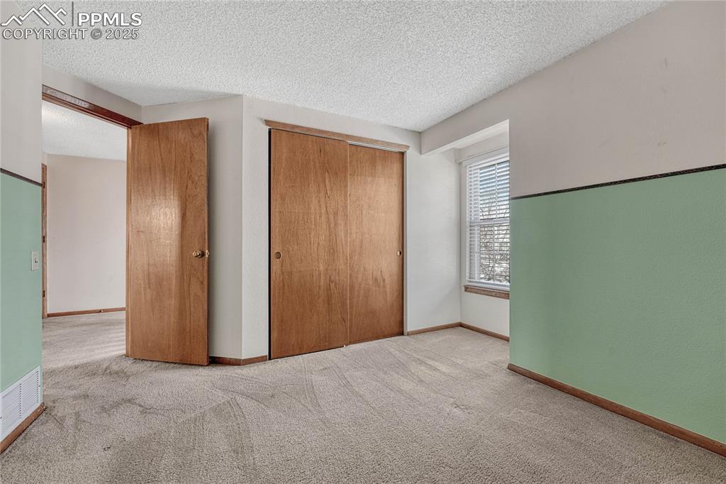 Image 23 of 28: Bedroom