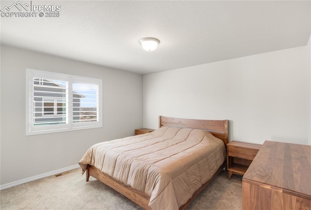 Image 20 of 39: Bedroom