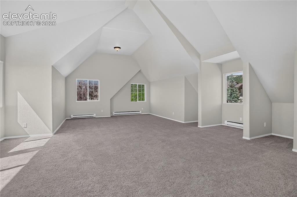 Image 17 of 37: Bonus space above entire 3-car garage