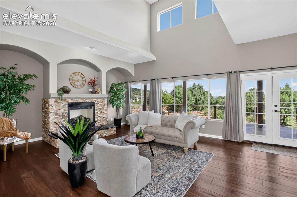 Image 6 of 37: Vaulted ceiling living room