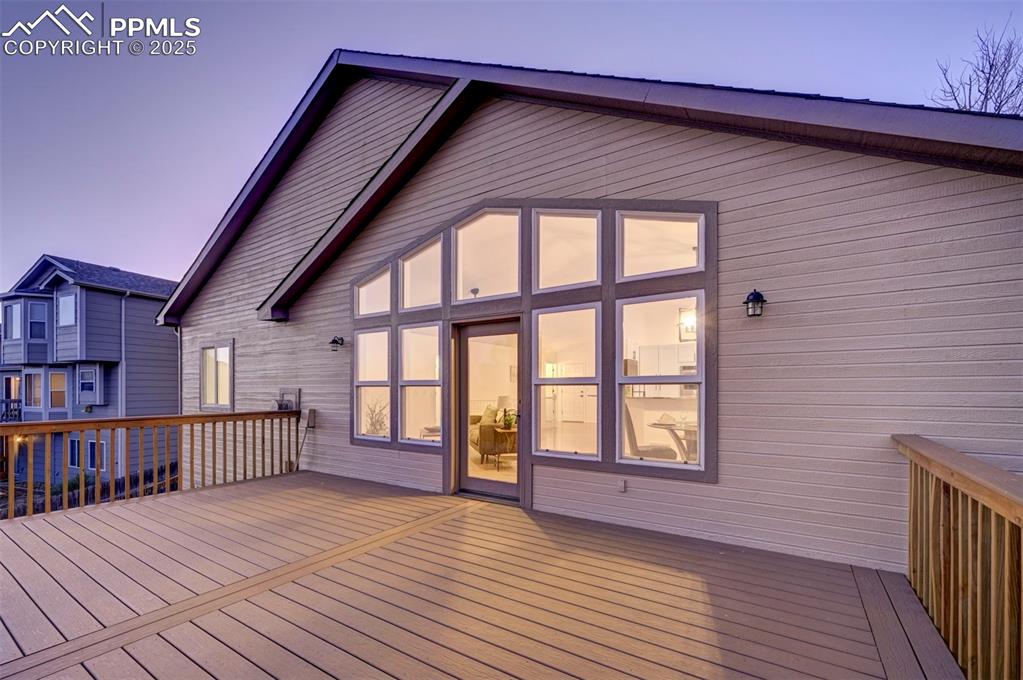 Image 10 of 50: View into the Great Room and Dining Room from the newly replaced composite