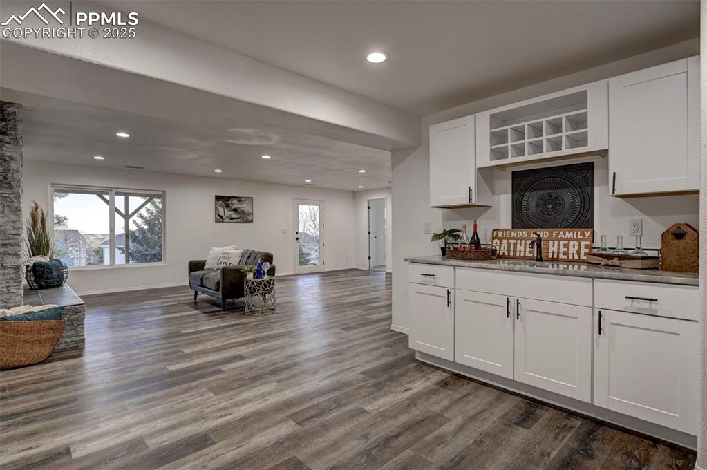 Image 39 of 50: View of the Family Room from the Flex Space and wet bar.