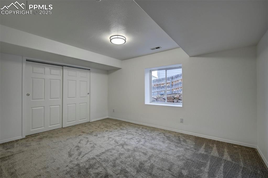Image 48 of 50: Basement Bedroom #5.