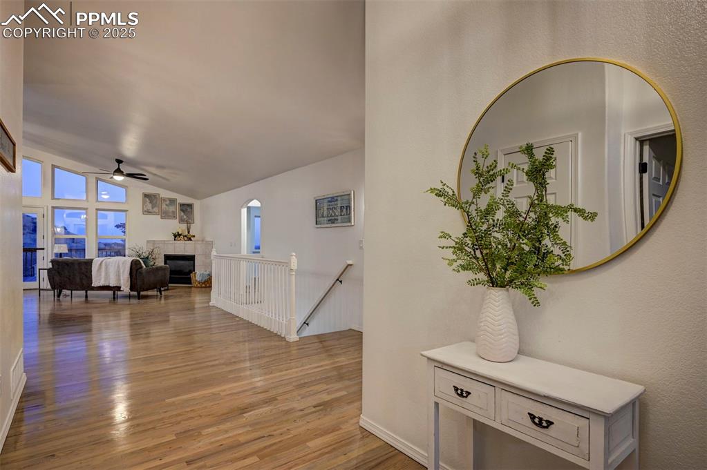 Image 6 of 50: Gleaming, refinished hardwood floors on the main level.