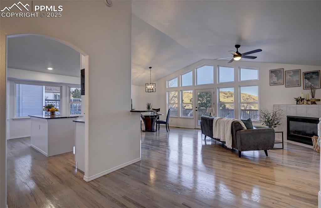 Image 7 of 50: Open floor plan w/ fresh paint, vaulted ceilings, & abundant windows that b
