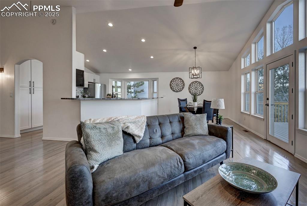 Image 8 of 50: View of the Dining Area and Kitchen from the Great Room.