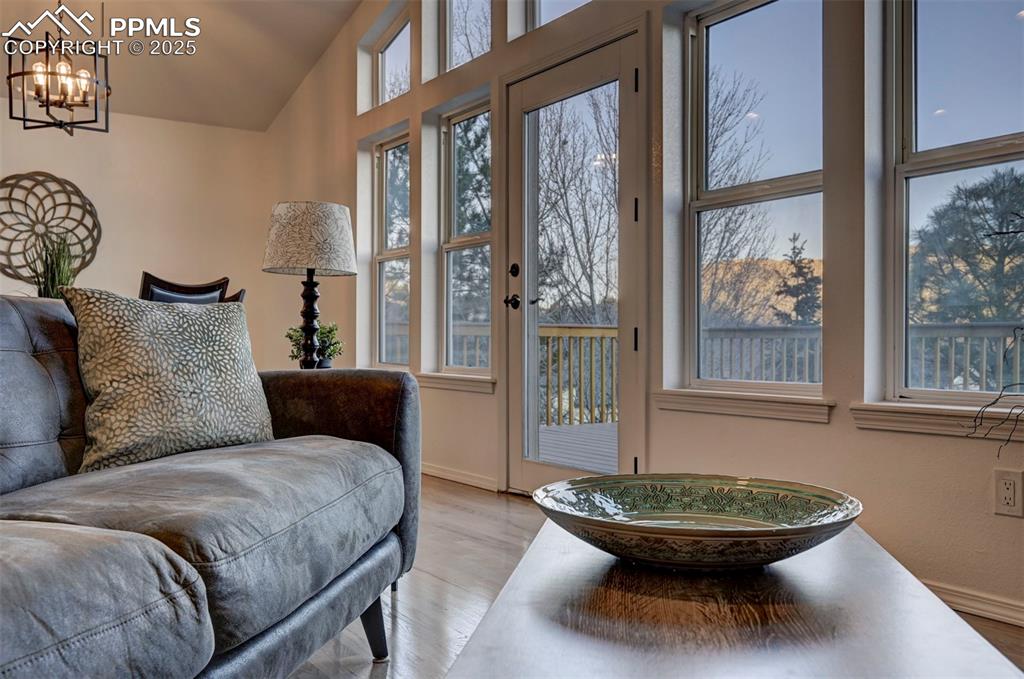 Image 9 of 50: Walk out from the Great Room to a large, new composite deck where you can e