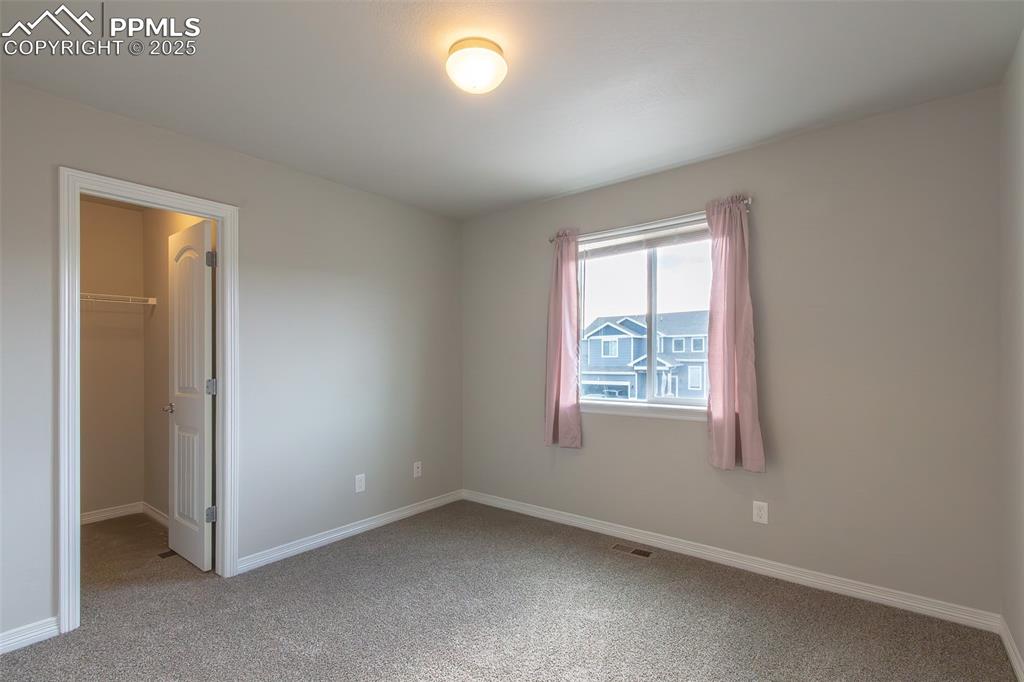 Image 23 of 28: Bedroom