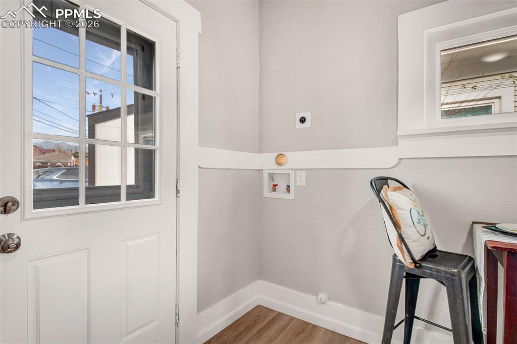 Image 8 of 24: Electric hookups for laundry and walkout access from the kitchen