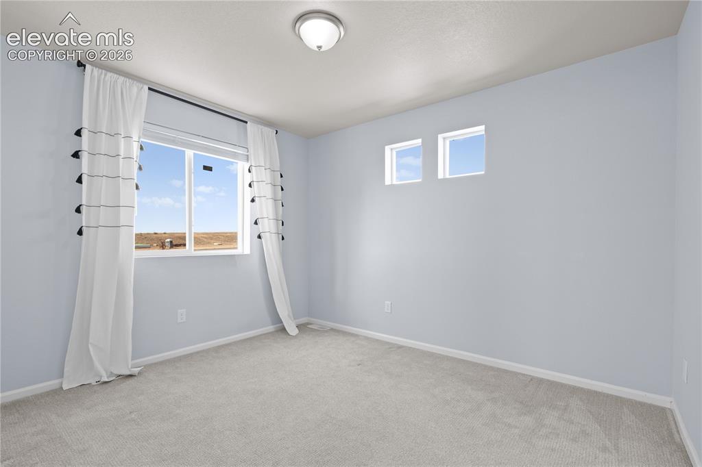Image 19 of 26: 2nd Bedroom