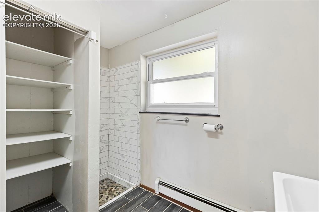 Image 21 of 25: Lower Bathroom/laundry space