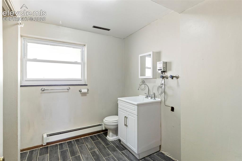 Image 22 of 25: Lower Bathroom/laundry space