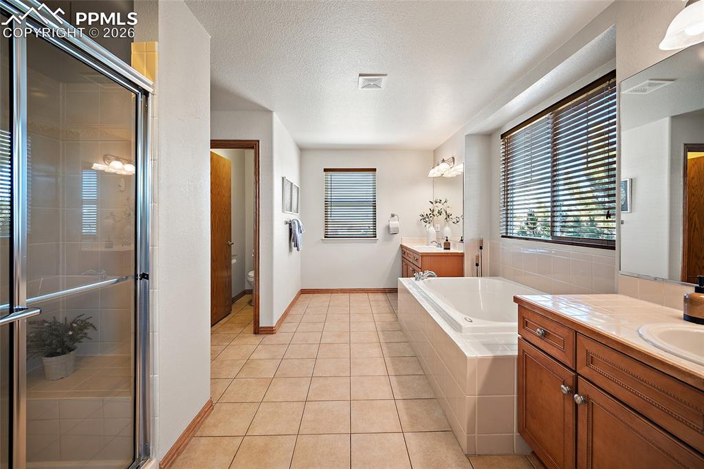 Image 28 of 50: Master Bedroom