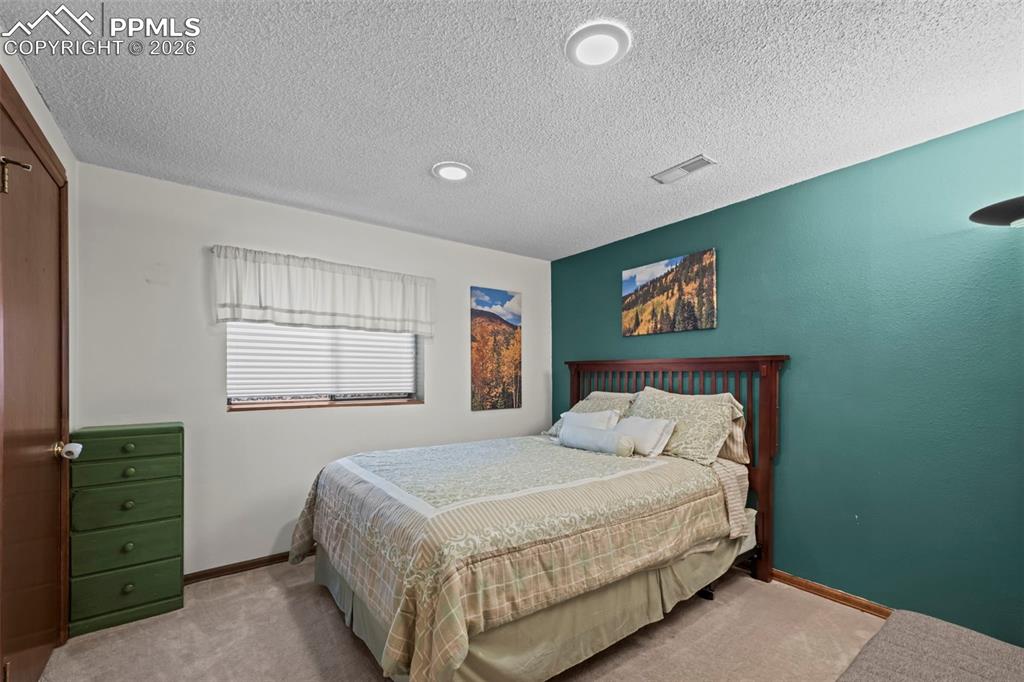 Image 16 of 35: Bedroom